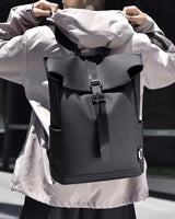 Consigned flap over backpack bag in black