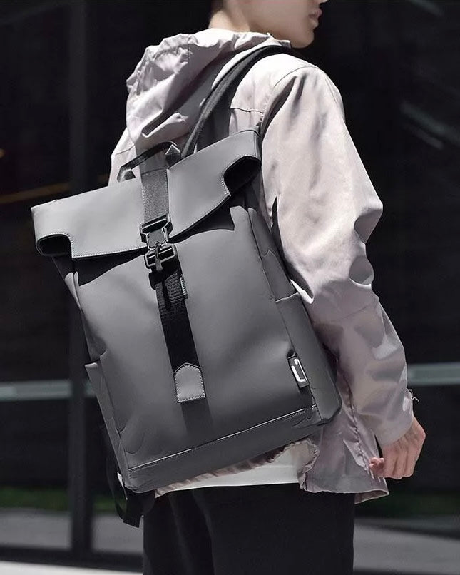 Consigned flap over backpack bag in grey