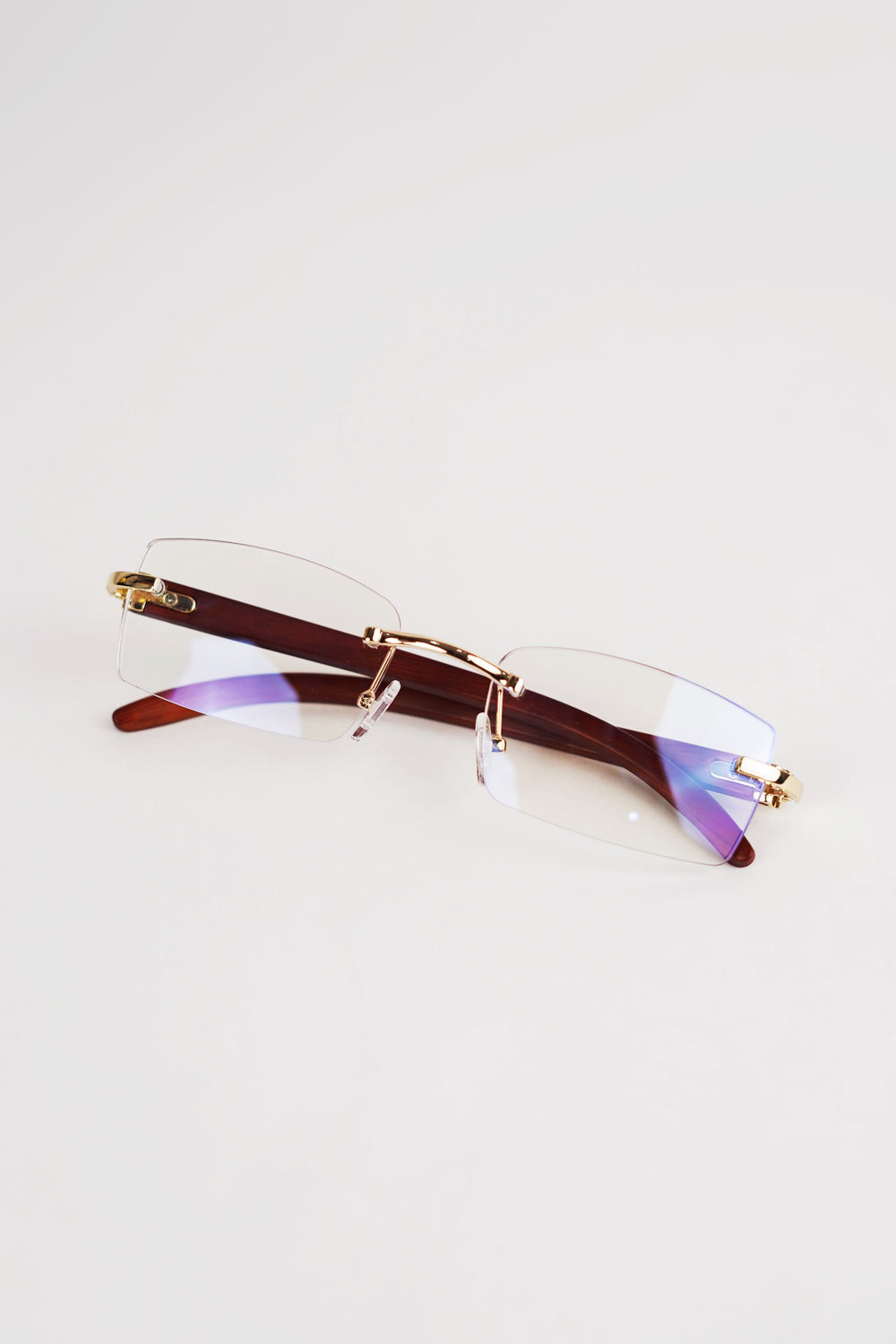 Buffalo Horn Rimless Wood Frame Sun glasses in Crystal
