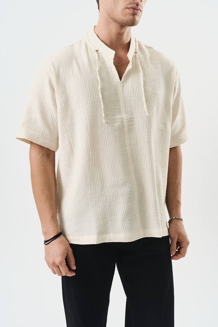 Retro club V neck shirt in beige