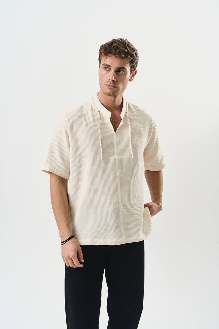 Retro club V neck shirt in beige