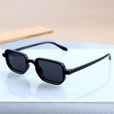 Polygonal sun glasses with curved bridge in black